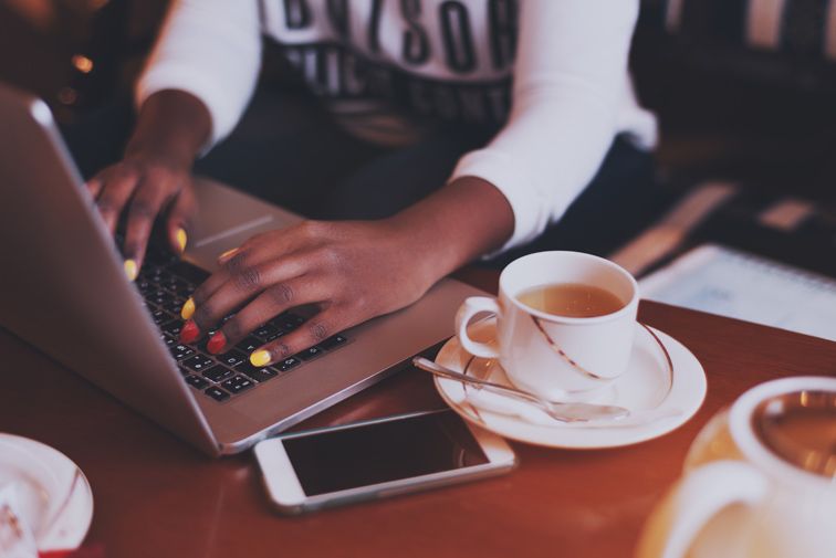 Woman Using Laptop